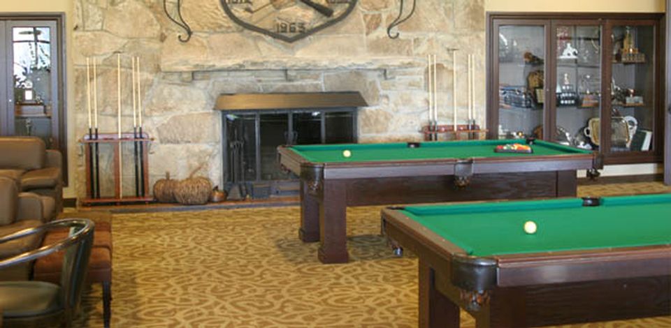 Custom built classic style pool table on rollers created by manufacturer designer Palason Billiards to help ease the moving of the pool table to different locations in a room or hall